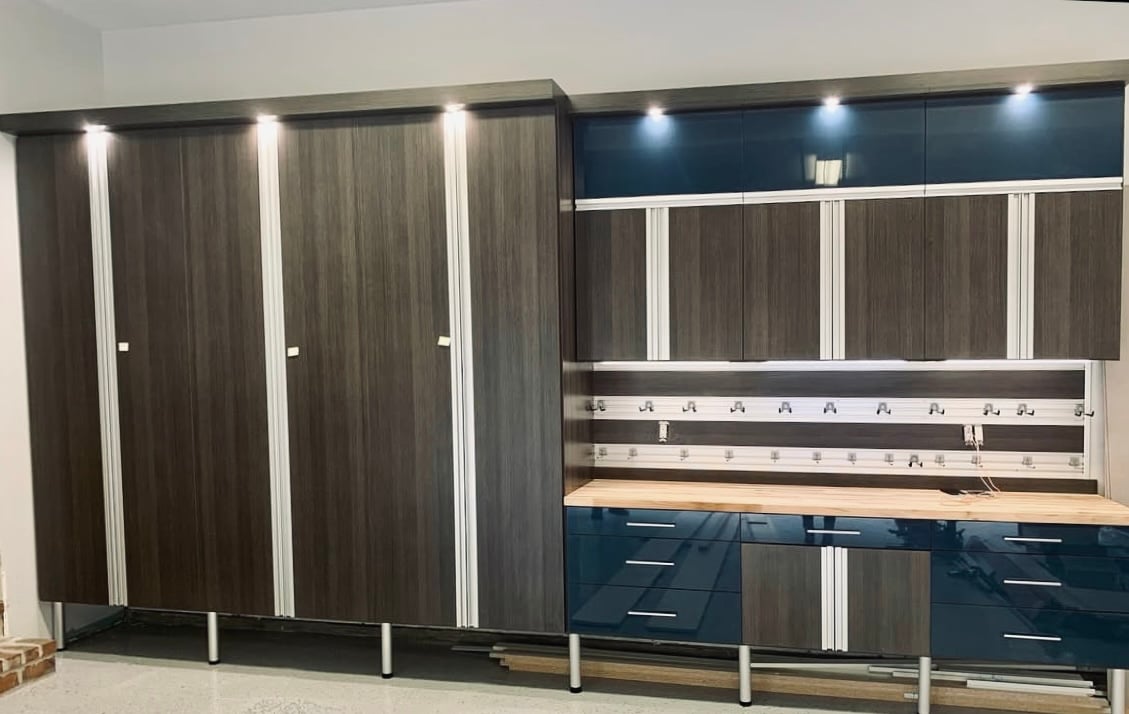 Garage Storage Dark brown custom cabinets for garage storage in garage closet lighting California Closets Gulf Coast & New Orleans