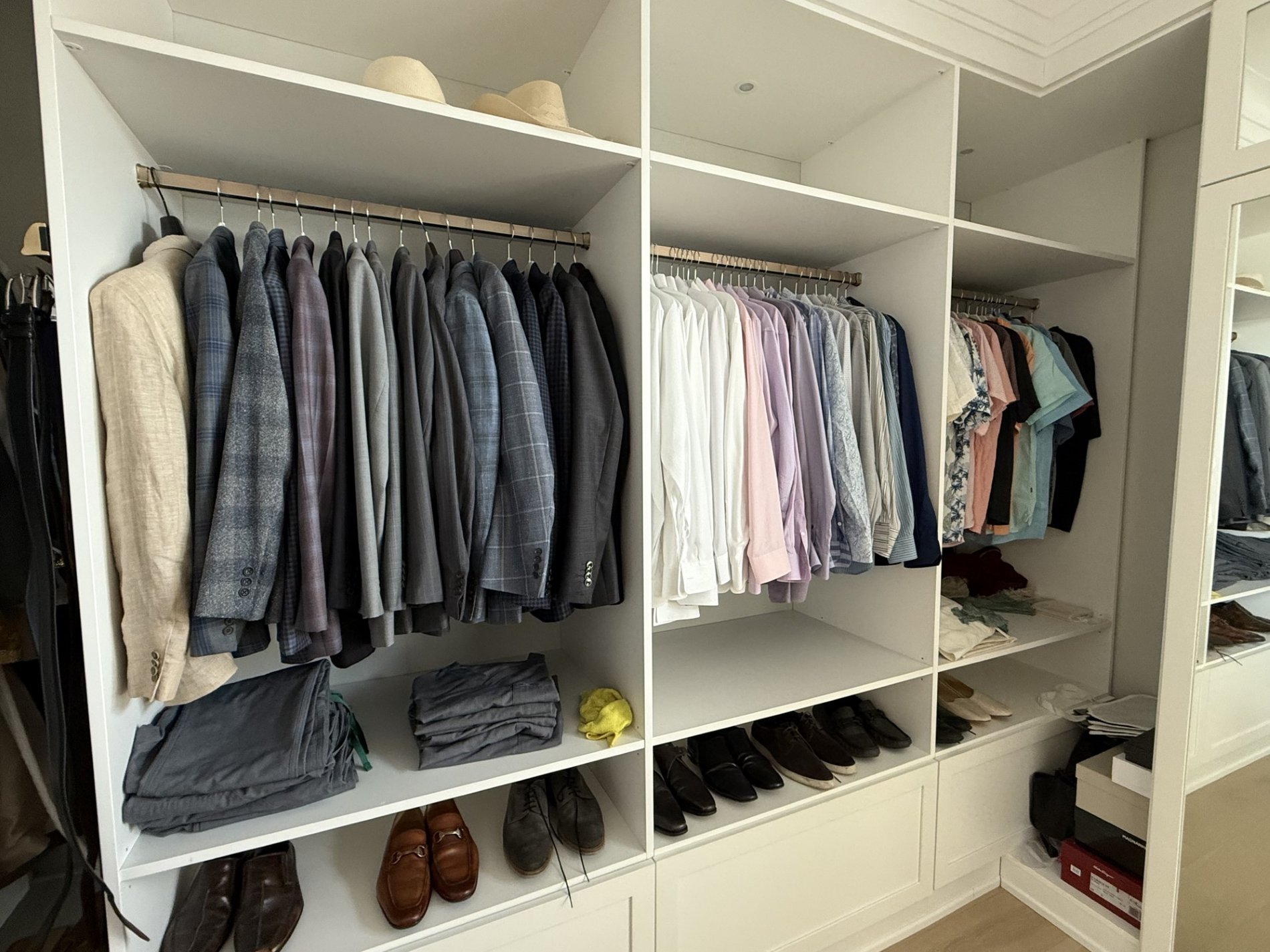 Men's Walk In Closet Men's walk in closet with space for suite jackets and shoes.