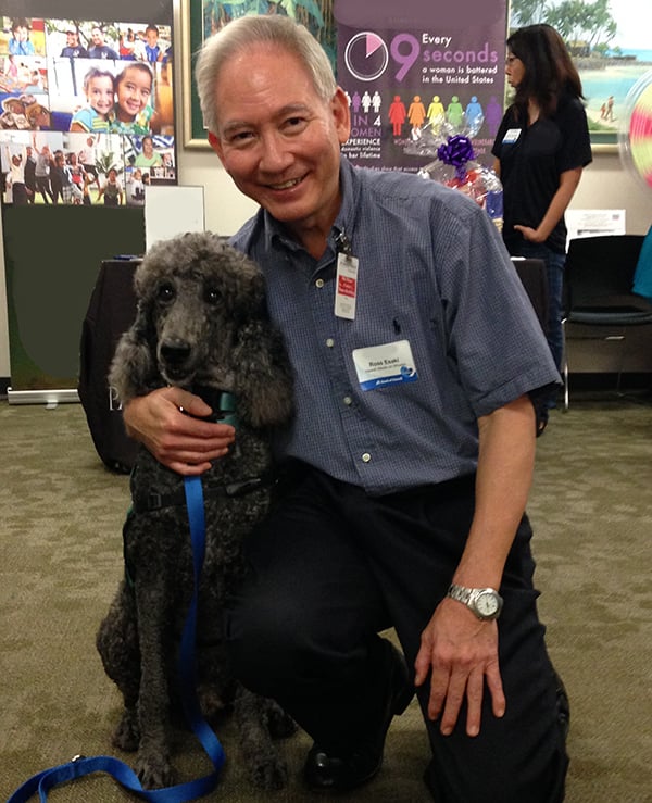 Ross Esaki representing his agency at an event.