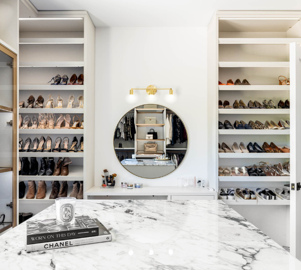 Modern Boutique Closet Img 4-California Closets Westchester County New York Full Room Walk-in Closet Marbel Center Island Custom Shoe Shelving Middle Vanity with Mirror, LED Lighting and Shelving