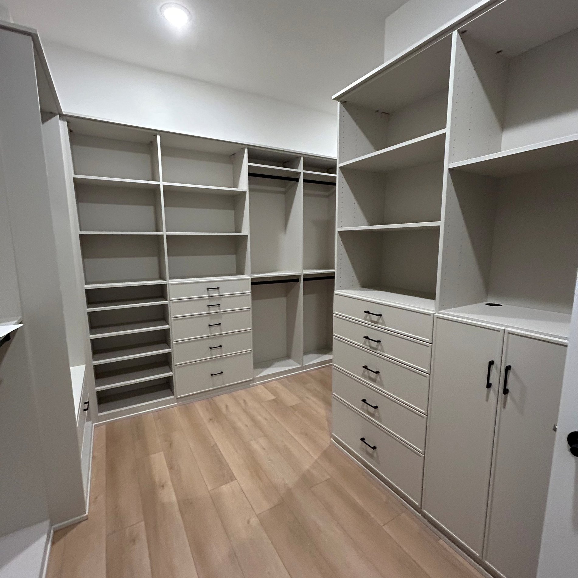Morning Light Walk-In Closet This is a Morning Light finished walk-in with 1 piece slim shaker doors and drawers.