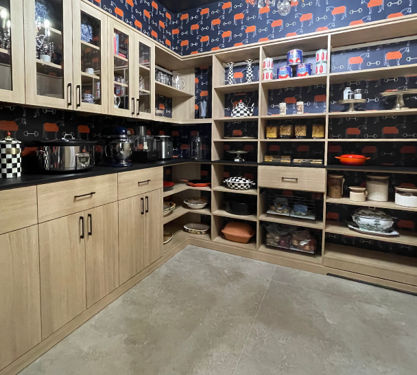 Custom Natural Wood Pantry Img 7 California Closets Hudson Valley New York Natural Wood Pantry with custom shelving to hold pots, pans, canned goods and spices and closed cabinet doors to hold kitchenware