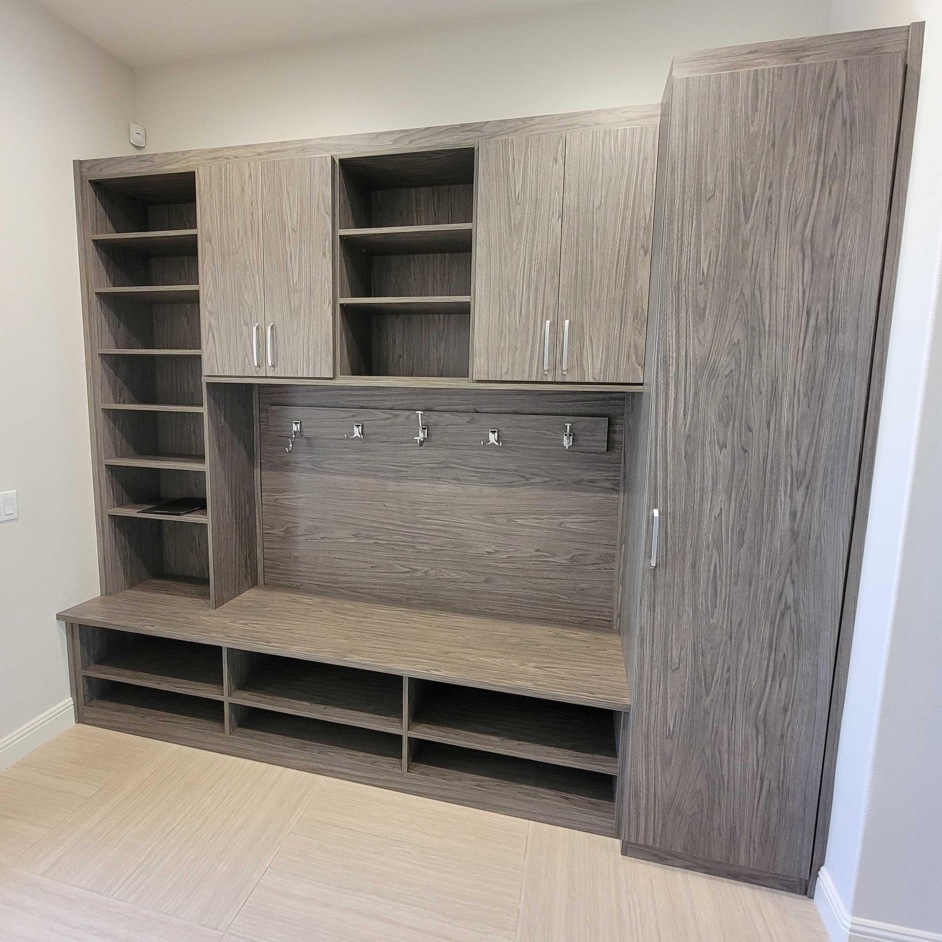 Grey Mudroom with Hooks custom built and locally made mudroom by California Closets San Diego, California.