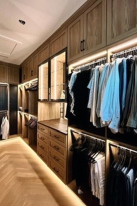 Luxury Floor-to-Ceiling Walk-In Closet with Full Lighting & Premium Finishes Floor-to-ceiling walk-in closet with integrated lighting and premium luxury upgrades throughout.