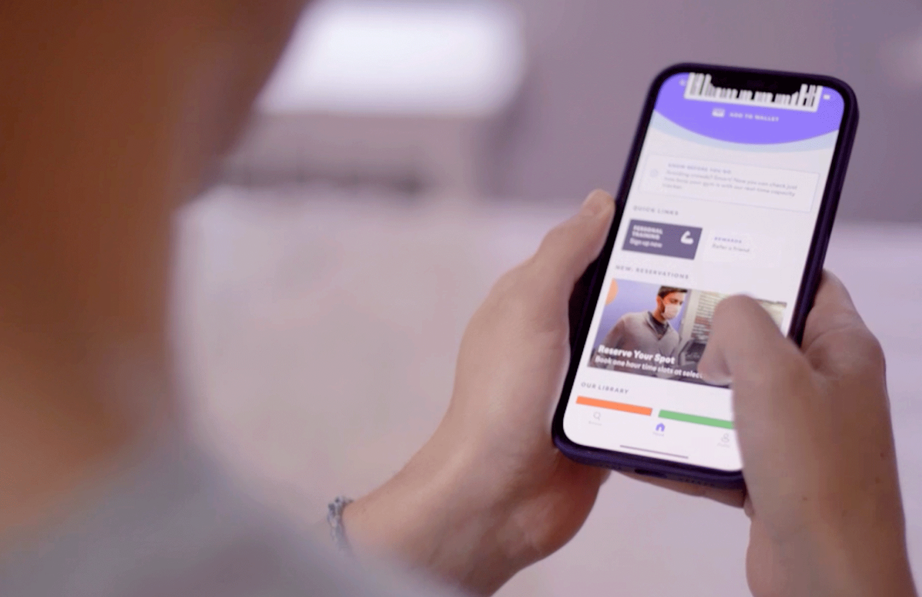 someone holding smartphone displaying the blink app