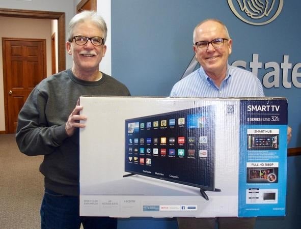 Steve Benefiel, the Winner of a TV given at Customer Appreciation Day.