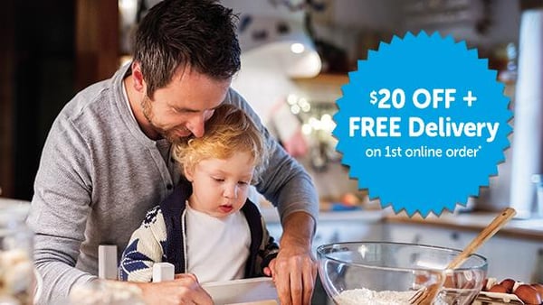 Father and child cooking together.