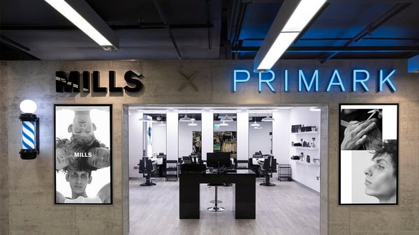 Image outside Joe Mills barber in Manchester store level -1.