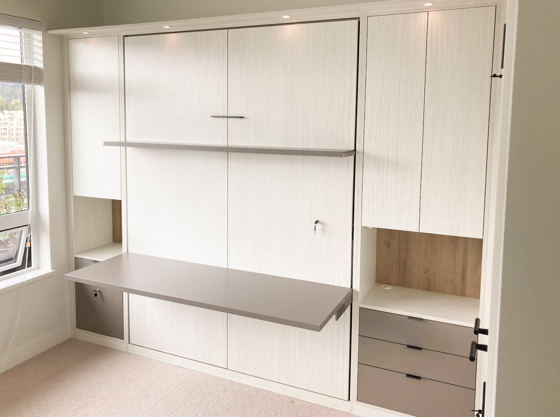 Wall bed with desk Wall bed with attached desk and shelf