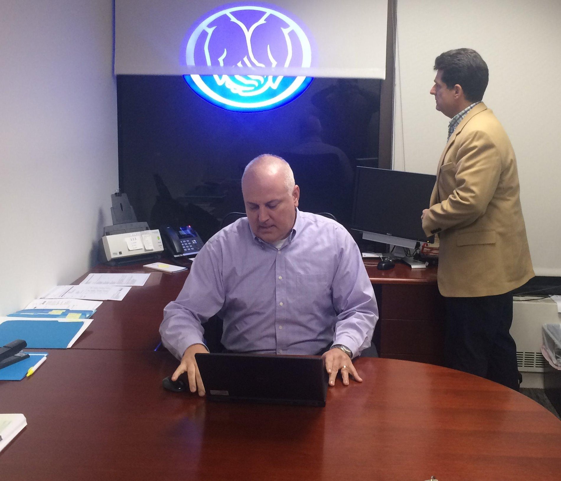 Our Personal Financial Representative, Hermann Trocha, in consultation with Agency Principle Peter Cuomo.