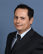 Carlos Enrique Oliveros, Insurance Agent