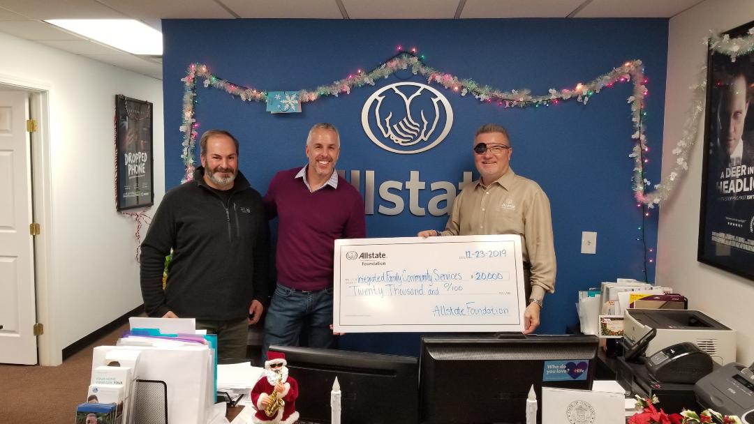 With Todd McPherson, Development Director for IFCS, presenting Integrated Family Community Services with a $20,000 Allstate Foundation Helping Hands grant.