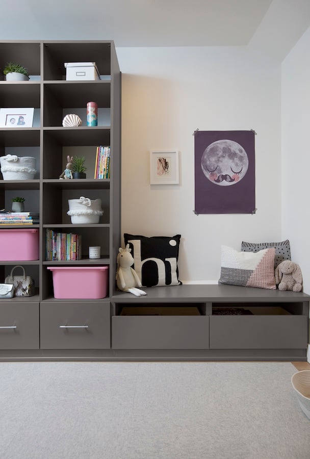 A Place for Everything Custom storage with built-in shelving, drawers and bench seating for organized books, toys and everyday essentials in a kids’ room. California Closets, Greater Detroit