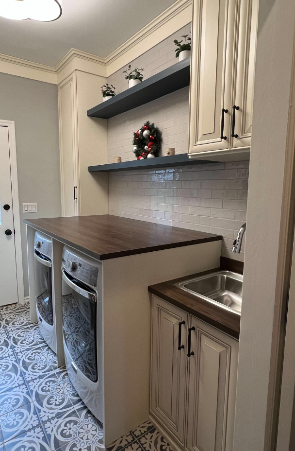 Custom Mudroom Mudroom with custom cabinets, shelving, sink, and a countertop.