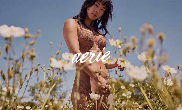 woman wearing underwear in a meadow