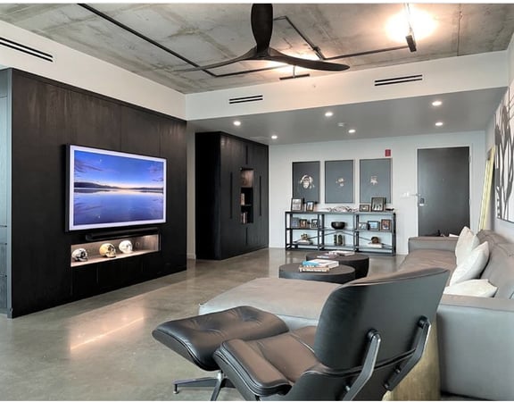 Entertainment Center Cabinets | California Closets Tampa Bay Custom entertainment center for a modern loft by California Closets Tampa Bay, Florida.