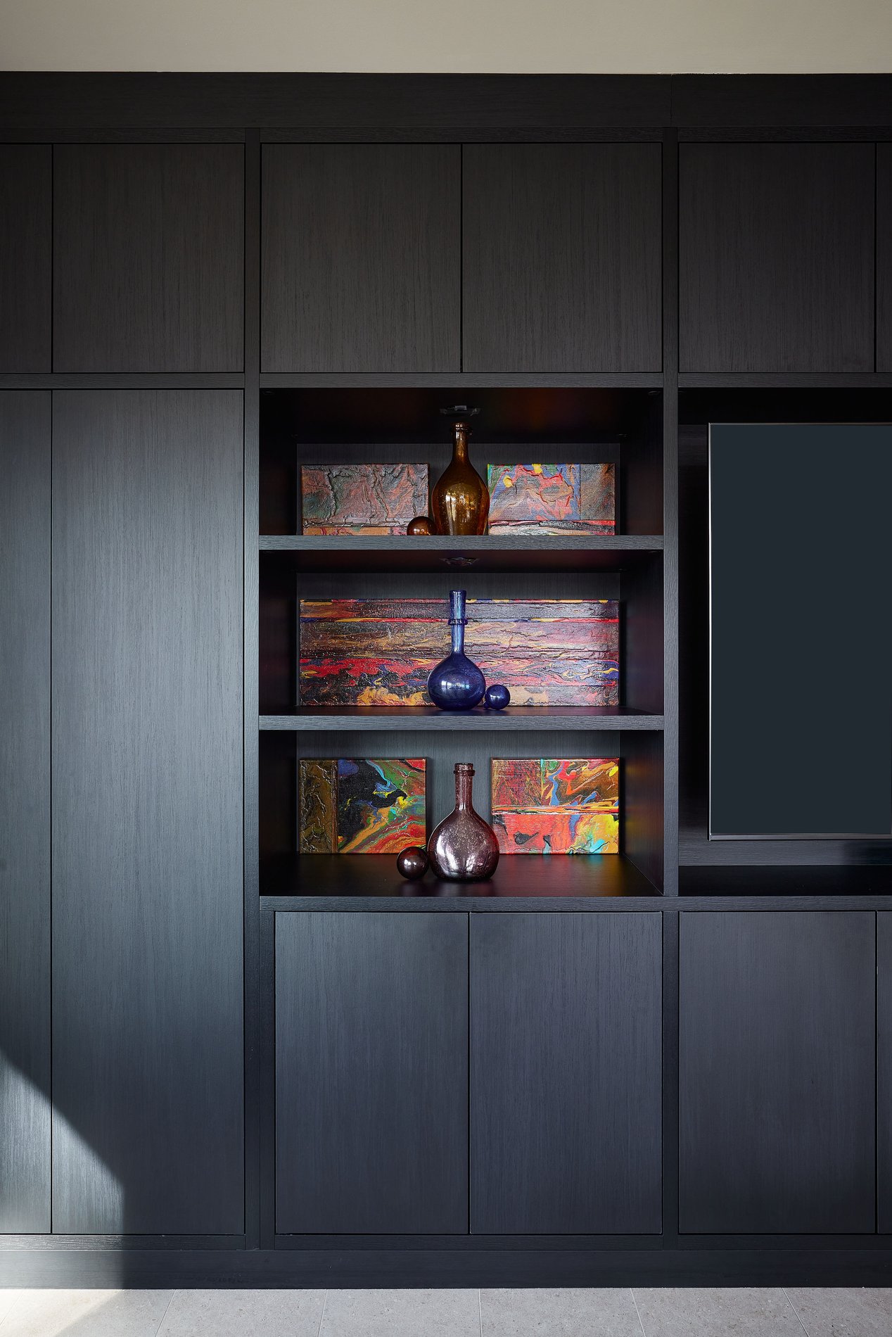 Custom Entertainment Center Entertainment Center in a Black Finish with push-to-open doors by California Closets Greenwich, Connecticut