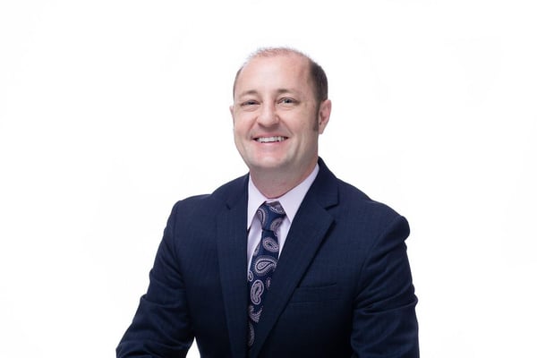 A headshot of Goosehead agent J. Scott Rutter