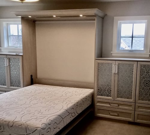 Wall Bed Surrounded by Built-Ins