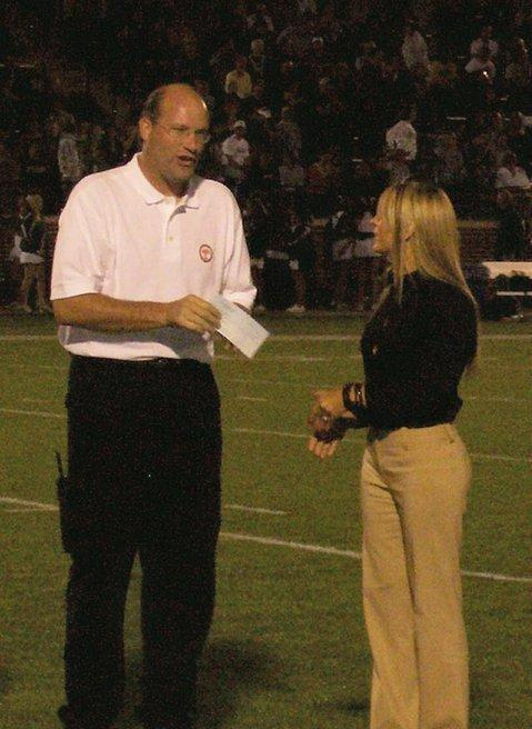 Helping the Edmond Football Team with a Good Hands Grant.