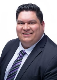 A headshot of Goosehead agent Alex Barrera