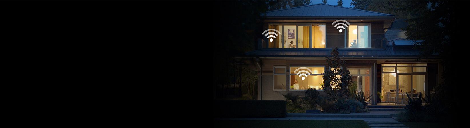 Photo of home at dusk fully connected with Optimum Whole Home Wifi service with built in smart wifi 6