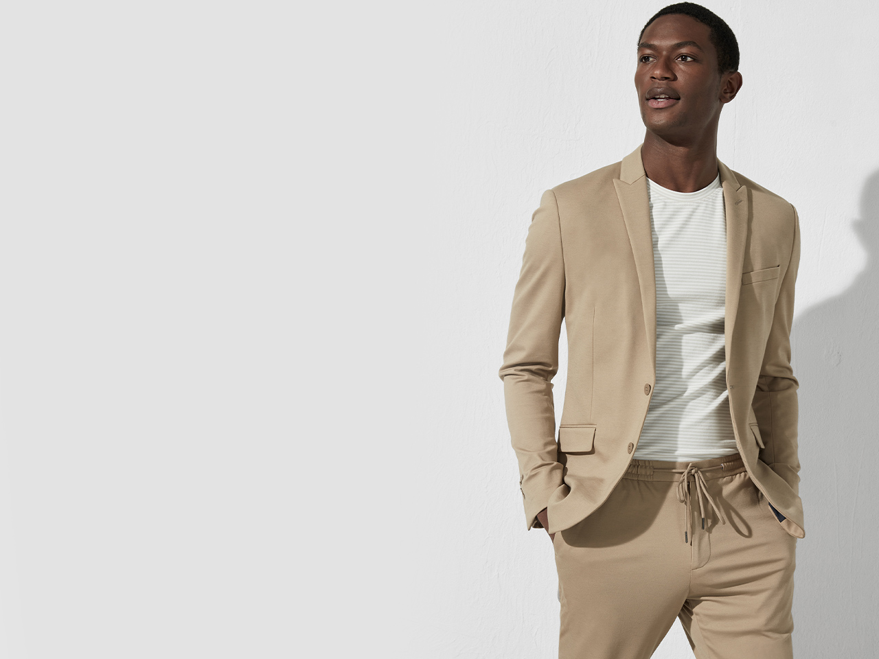 Man wearing Express suit.