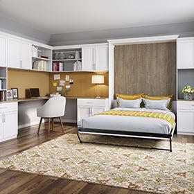 Your wall bed questions answered Custom murphy bed system with shelving and desk with chair by California Closets Missoula & Western Montana.