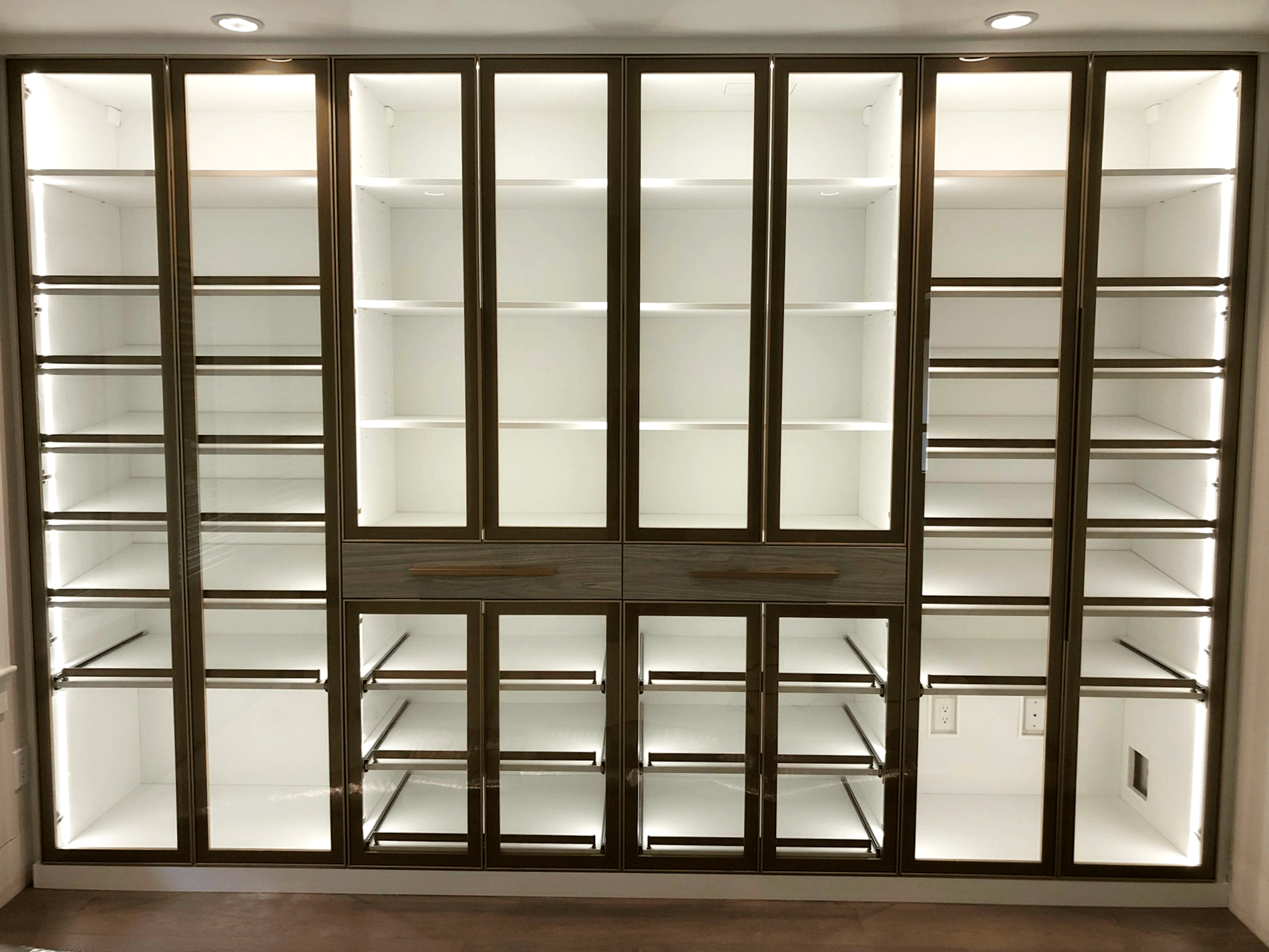 Wall unit with glass doors Wall unit with glass doors and pull out trays inside