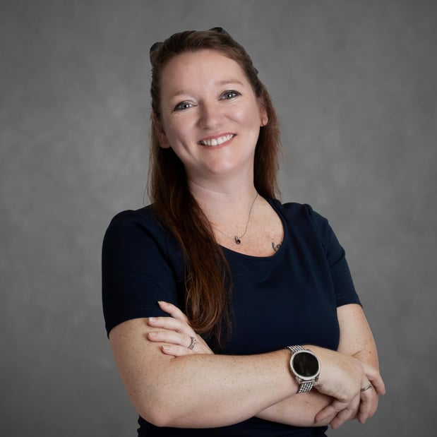 Agent Jamie Santistevan profile photo in front of a gray background