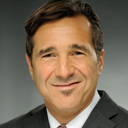 Charlie Mustachia, Managing Director