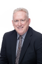 A headshot of Goosehead agent Scott Petty