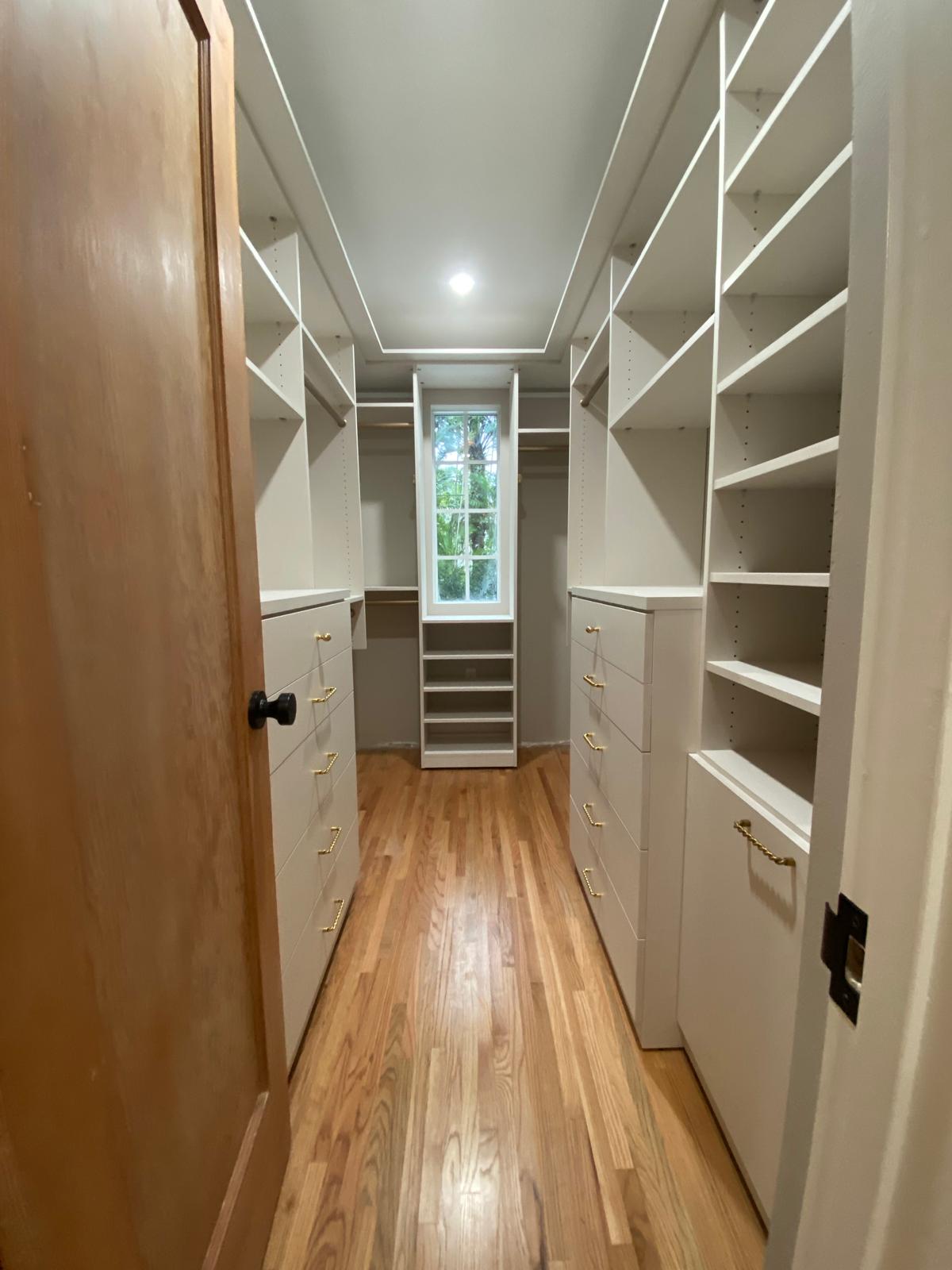 Narrow Spaces, No Problem walk in closet in morning light finish