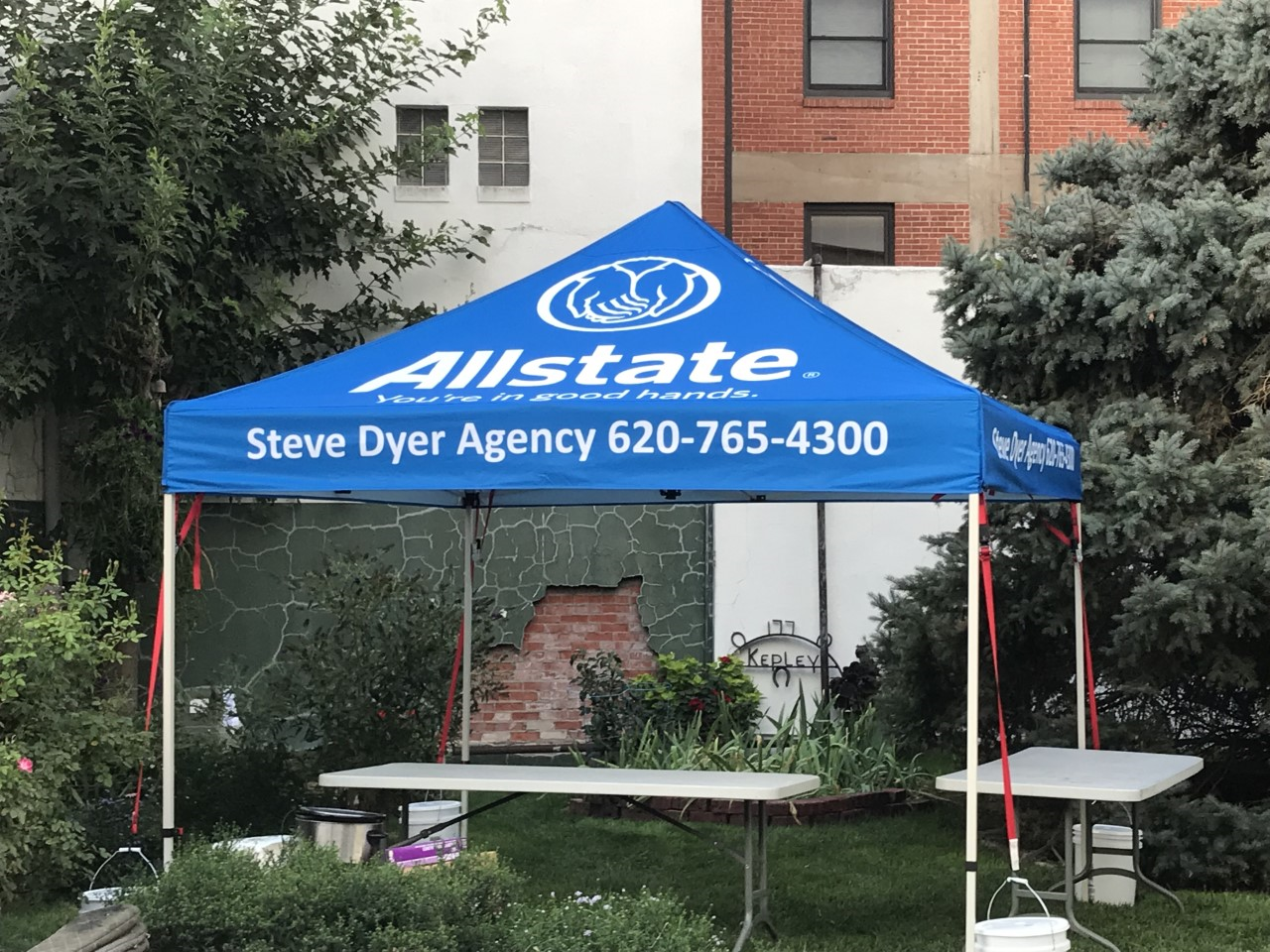 Getting the Steve Dyer Agency - Allstate Insurance booth set up at the Downtown Fall Fest Octoberfest celebration.