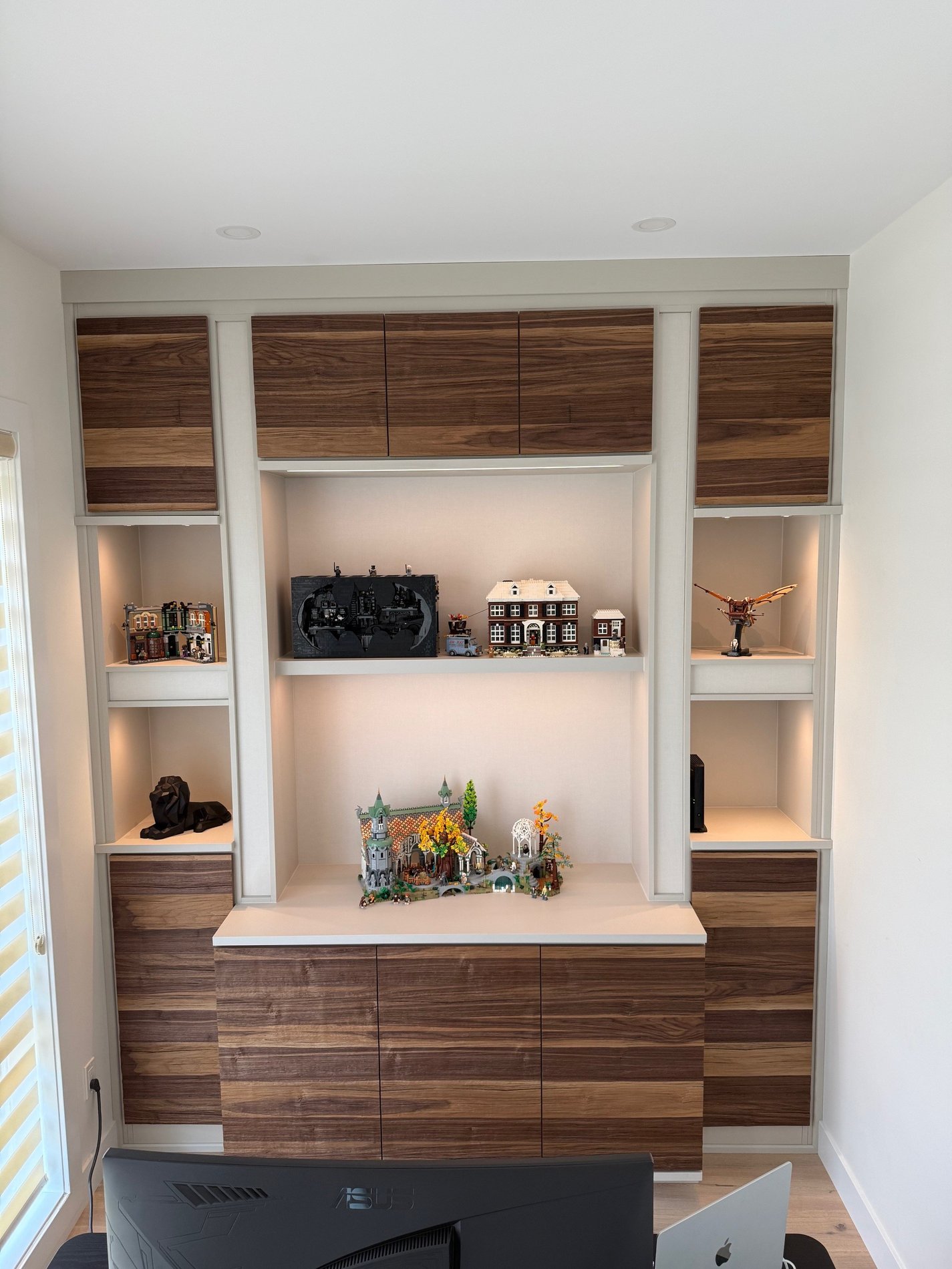 Classic and Textured Floor to ceiling storage in a white finish with deep textured door fronts in a reddish brown colour.