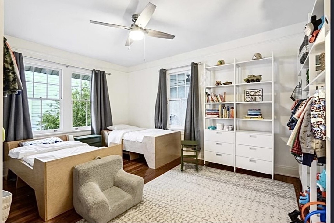 Kid's Room Bookcases and bookshelves with drawer stack for a kid's custom closet design California Closets New Orleans & Gulf Coast