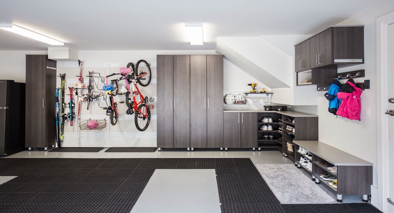 Custom Design Garage Garage storage with cabinets with dark wood cabinets and fusion track wall