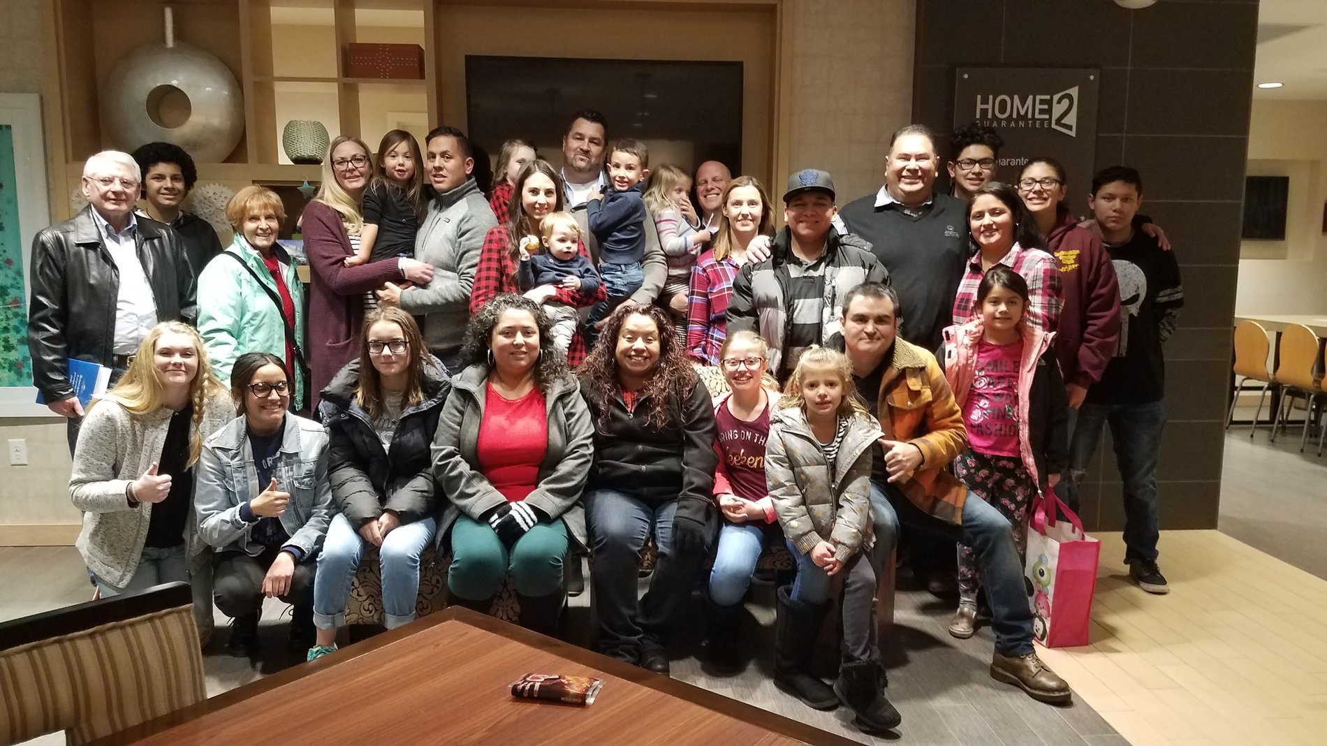 Christmas dinner with employees and families.