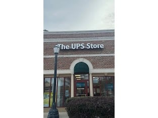 Facade of The UPS Store Apex In Olive Chapel Village