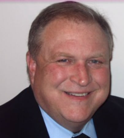Male agent William Pritchard profile photo in front of a white background