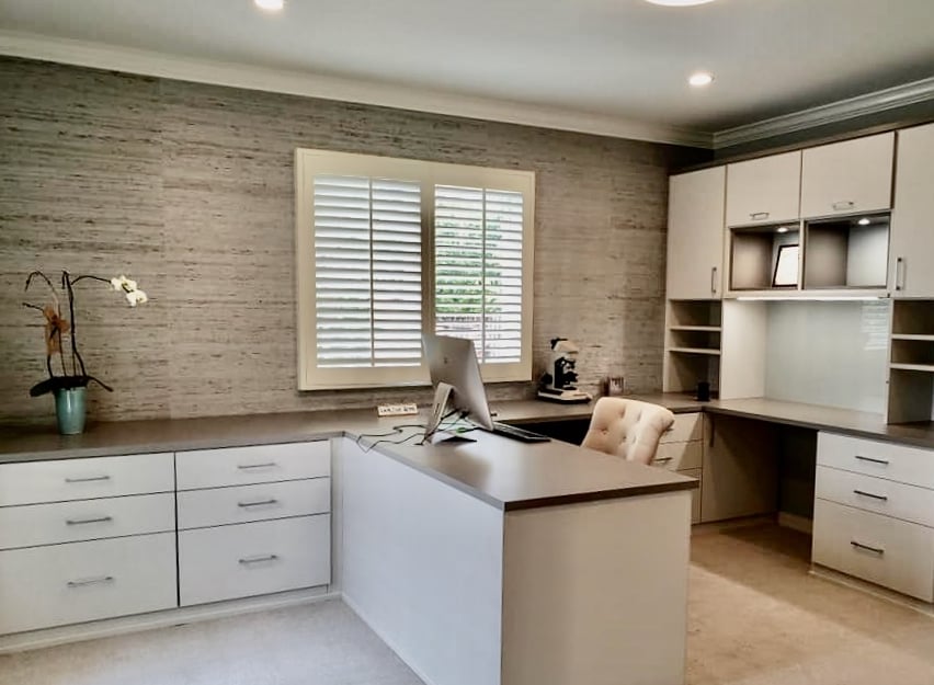 Elegant office with desk and built-in storage. Elegant office with desk and built-in storage.