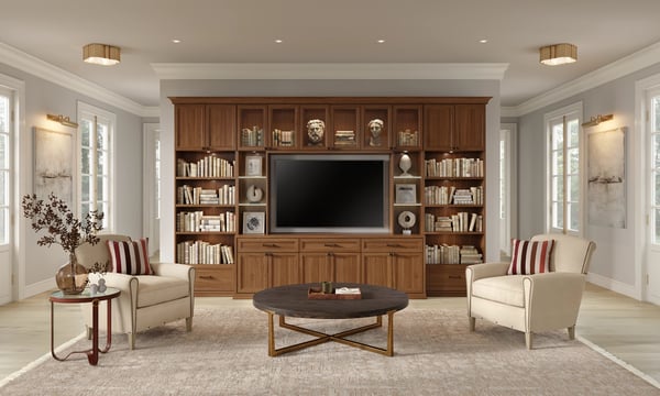 Custom traditional media center with built-in bookcases, wood cabinetry, and integrated TV display by California Closets Memphis, Tennessee.