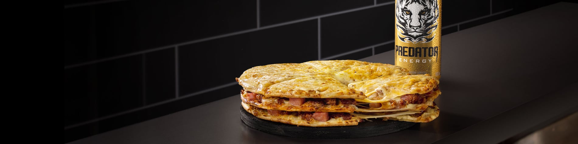 Debonairs Pizza lunch promotion ¬¬¬– FREE 500ml Predator™ Energy Drink with any small Triple-Decker® pizza