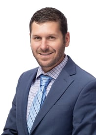 A headshot of Goosehead agent Casey Coker