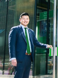 TD Bank  employee opening door to store