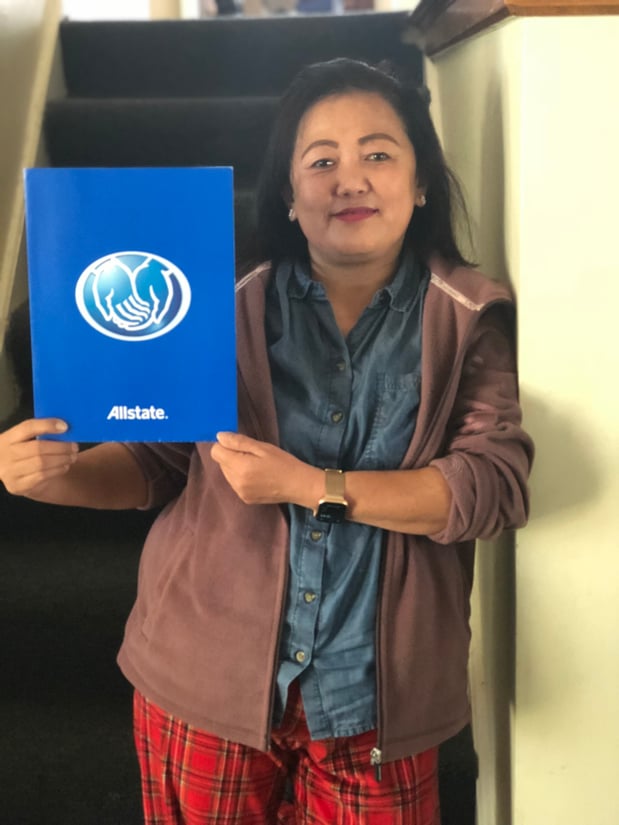 She can express her happiness to an agency by showing a big smile on her face.