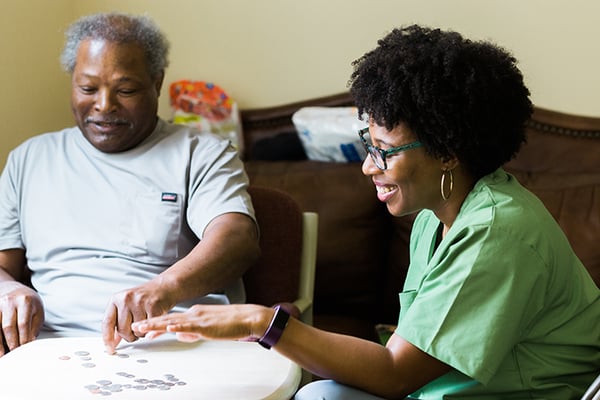 An occupational therapist providing home health care