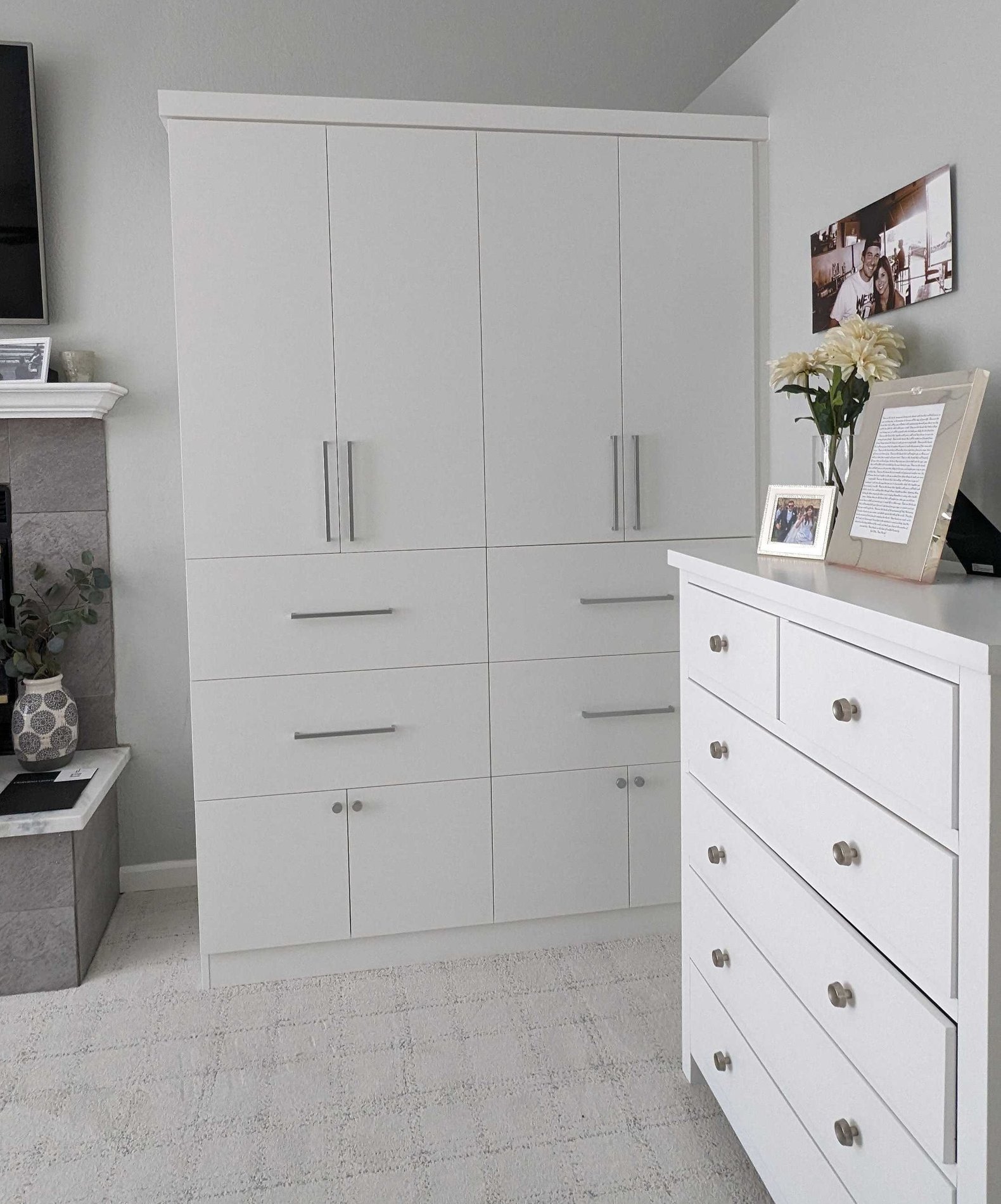 White Modern Wardrobe by California Closets San Diego White Cabinetry wardrobe style closet by California Closets San Diego.