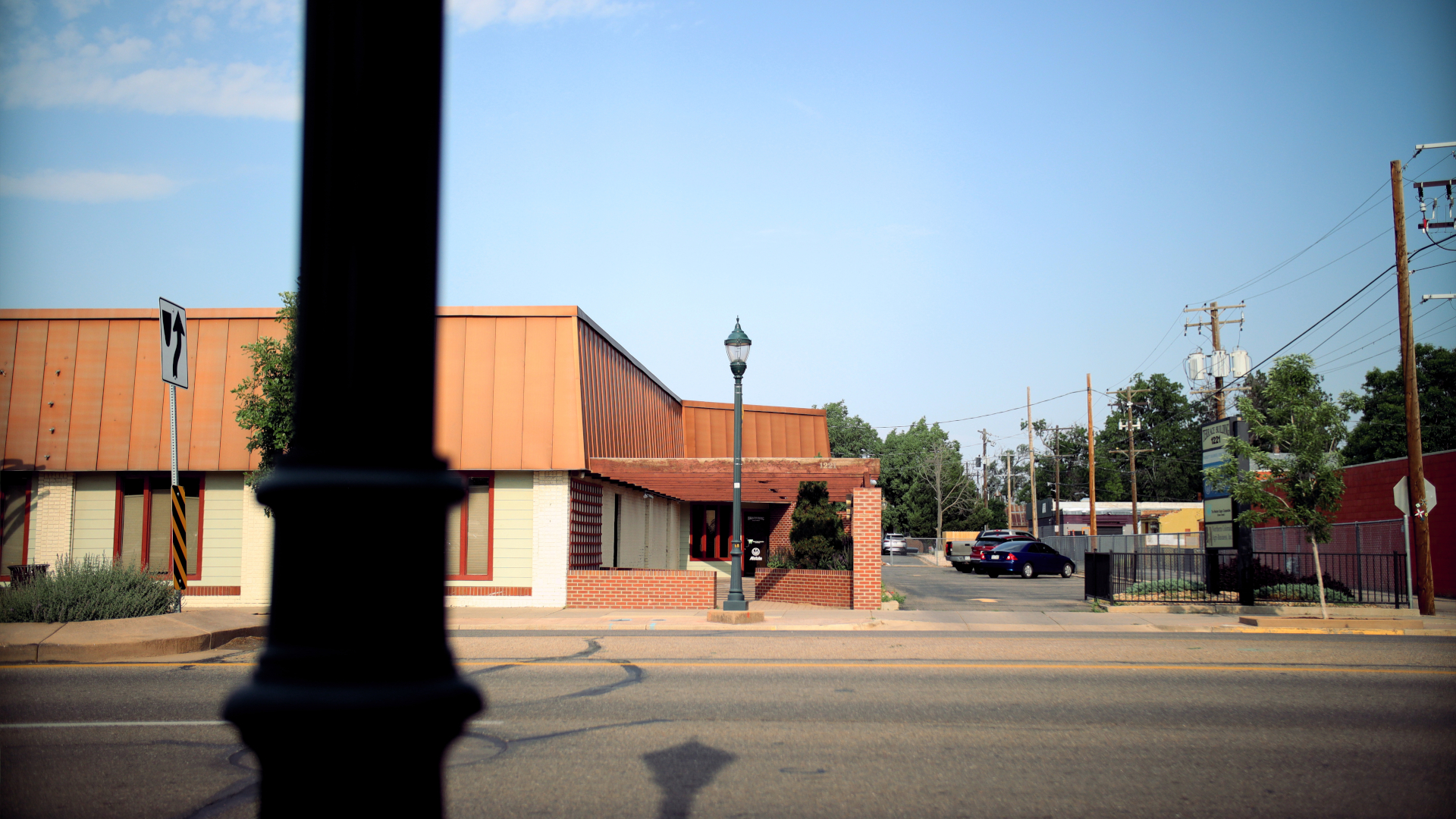 View of the entrance to the building from across 8th Ave