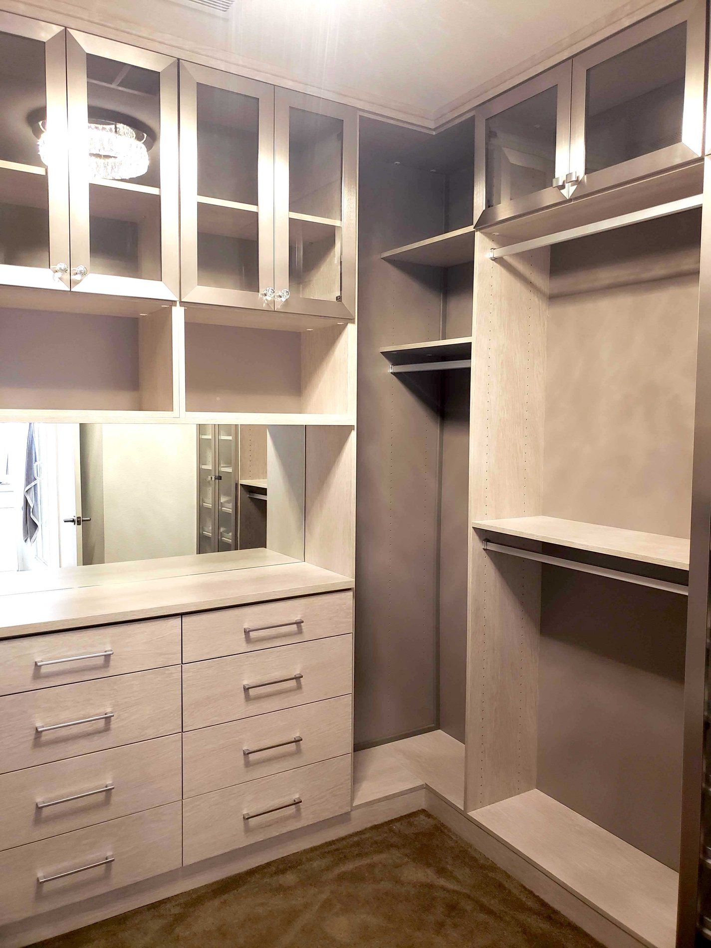 White walk-in closet with Glass Doors custom built and locally made custom closet